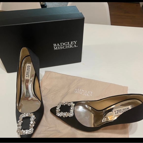 Size 9. Worn once for 3 hours. Extra heel tips and stones shoe bag original box